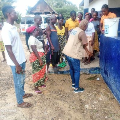 Teaching villagers the method of hands washing